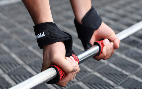 Muñequera de potencia vs. Lifting Straps: ¿Cuál elegir?
